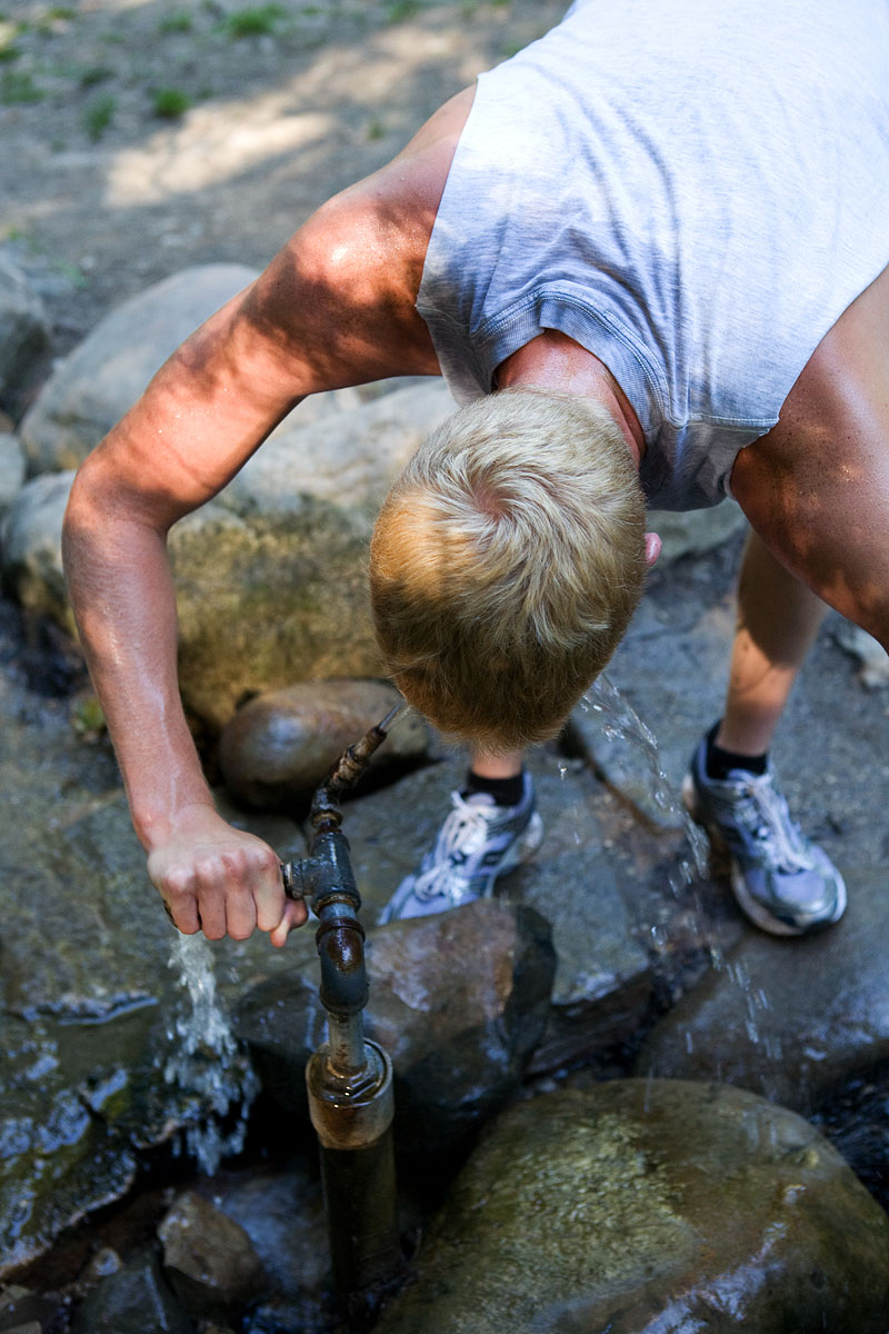 Jogger drinking from the spring at Pokagon State Park